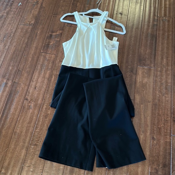 One piece Trina Turk black and white jumpsuit. - Picture 1 of 4